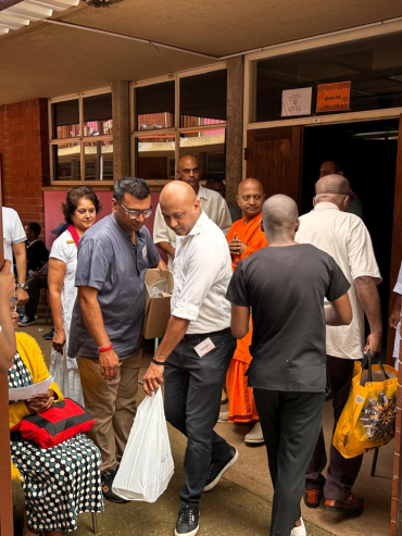Revered Swami Swatmaramanandaji Maharaj with Clinic Staff