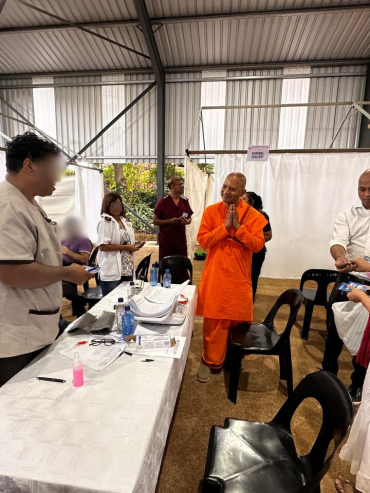Revered Swami Swatmaramanandaji Maharaj with Clinic Staff